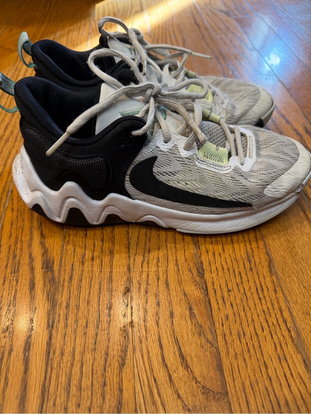 Nike Kids Black & White Athletic Sneakers with Subtle Green Accents Gianna’s
